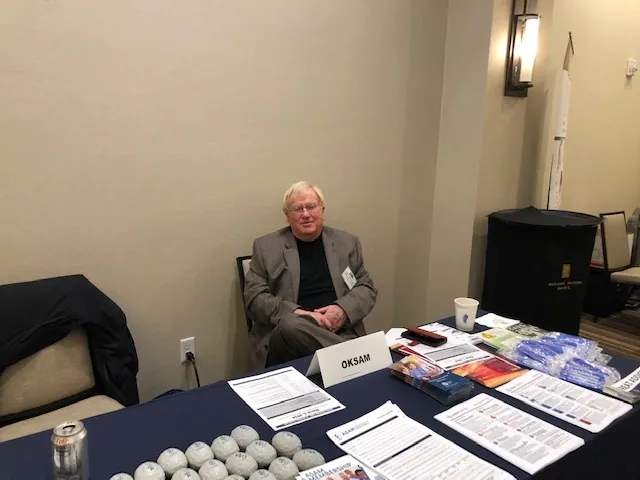 Four doctors networking at a meeting